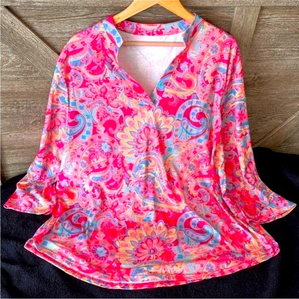New Boutique women’s blouse. I have sizes 1X through 3X. Beautiful pink design!